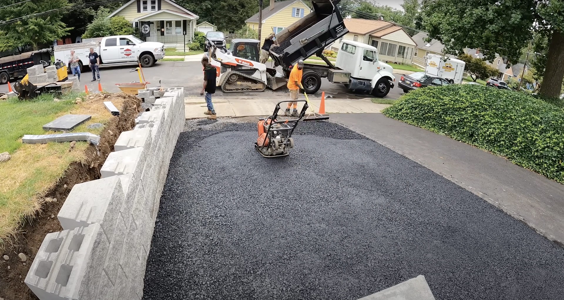 Commercial concrete and asphalt installation project with professional equipment in Grapevine, TX