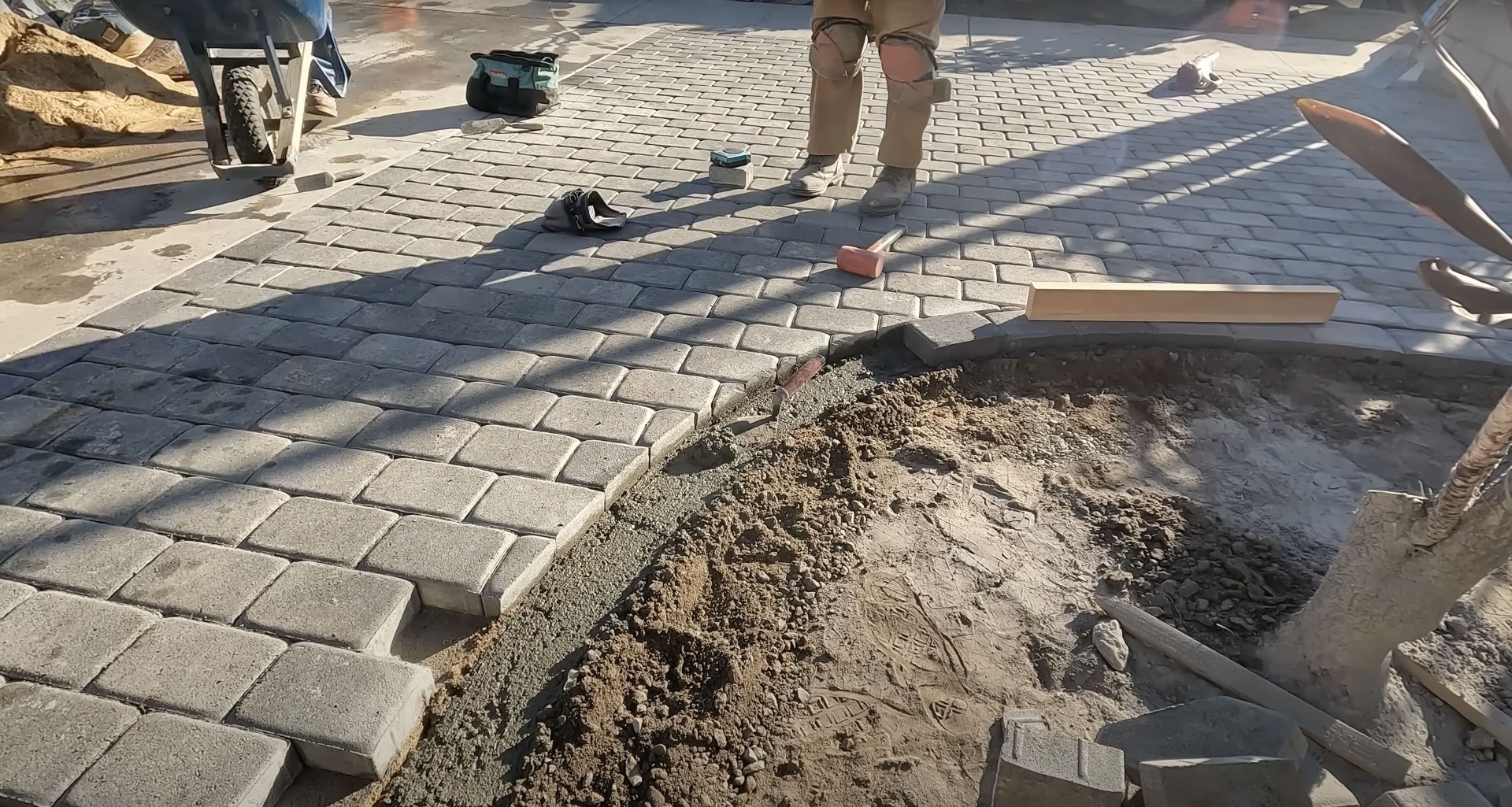 Interlocking paver installation process showing precision concrete work in Grapevine, TX